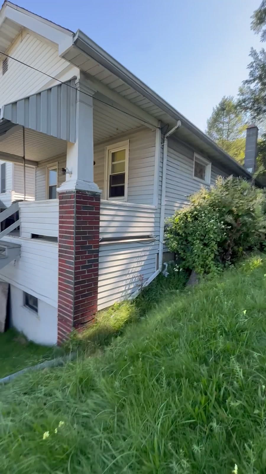Front of the house with a covered porch. September 11, 2026 walkthrough.